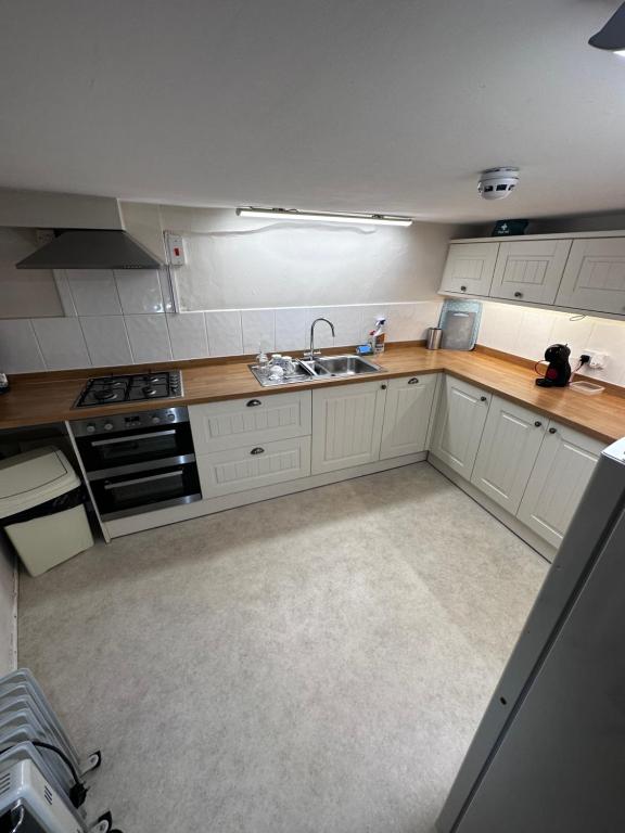 Shared fully fitted guest kitchen at Thirty-Six BnB